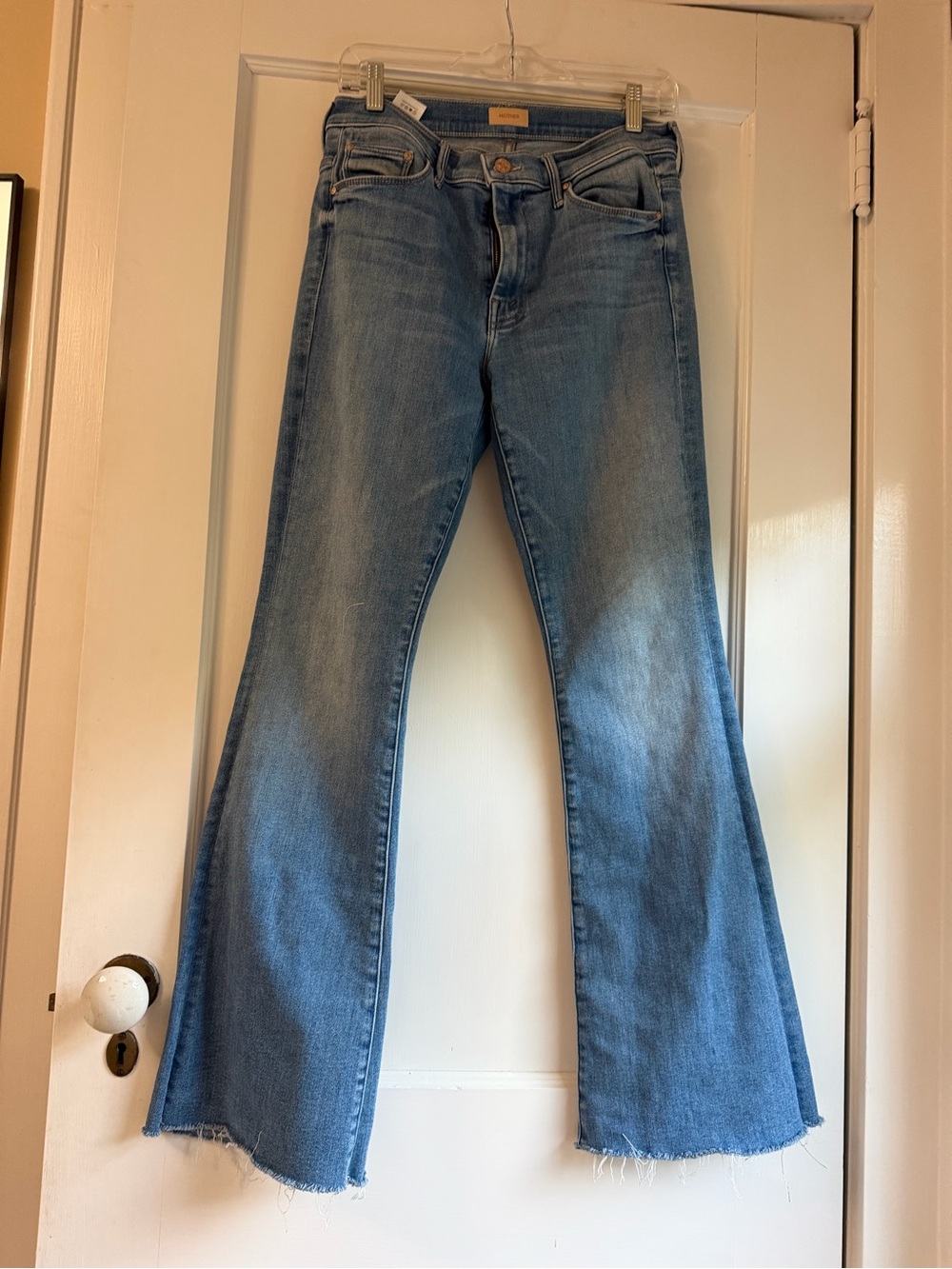 MOTHER weekender fray Blue Flare Jeans with Raw Hem